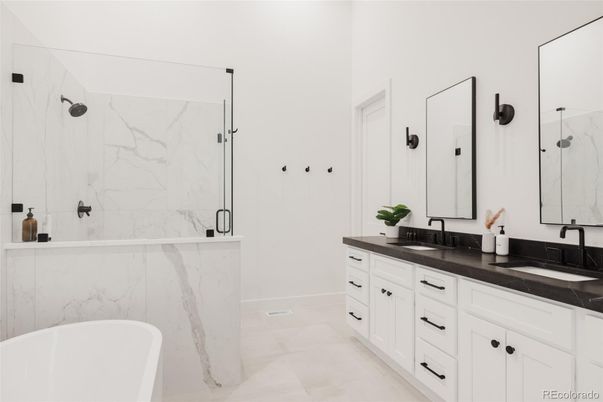 Bathroom, Dual Sink Vanities, Free Standing Baths, Glass Shower, Interior, Marble Walls