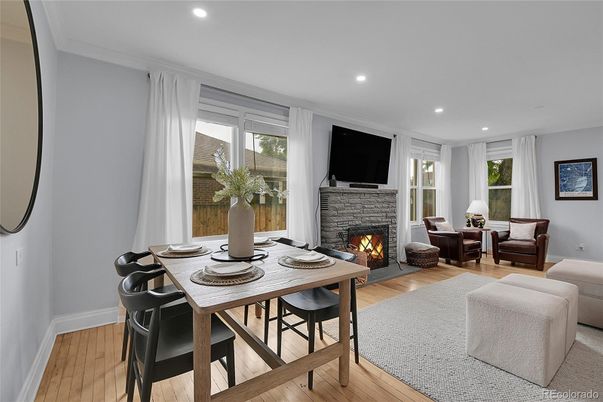 Dining room, Fireplace, Interior, Living room, Recessed Lighting, Wood Texture Flooring