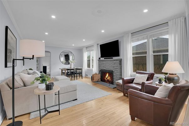 Dining room, Fireplace, Interior, Living room, Recessed Lighting, Wood Texture Flooring