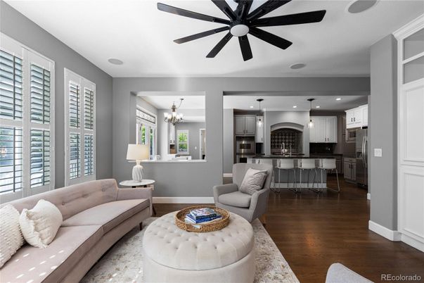 Chandelier, Interior, Kitchen, Living room, Pendant Lights, Recessed Lighting, Stainless Steel Appliances, Wood Texture Flooring