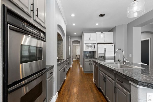 Interior, Kitchen, Pendant Lights, Recessed Lighting, Stainless Steel Appliances, Wood Texture Flooring