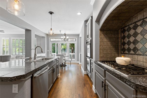 Dining room, Interior, Kitchen, Pendant Lights, Recessed Lighting, Stainless Steel Appliances, Wood Texture Flooring