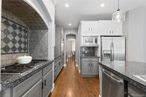 Interior, Kitchen, Pendant Lights, Recessed Lighting, Stainless Steel Appliances, Wood Texture Flooring