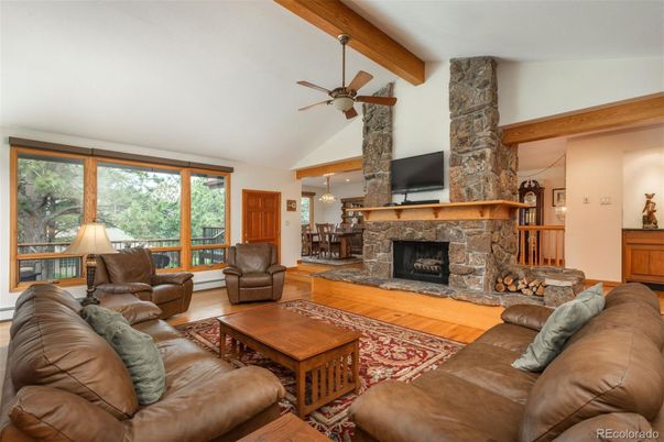 Dining room, Fireplace, Interior, Living room, Pendant Lights, Stone Walls, Wooden Beams, Wood Texture Flooring
