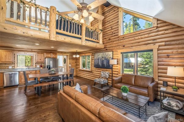 Dining room, Interior, Kitchen, Living room, Recessed Lighting, Stainless Steel Appliances, Wood Texture Flooring, Wooden Walls