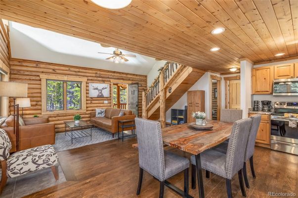 Dining room, Interior, Kitchen, Living room, Recessed Lighting, Stainless Steel Appliances, Wooden Ceilings, Wood Texture Flooring, Wooden Walls