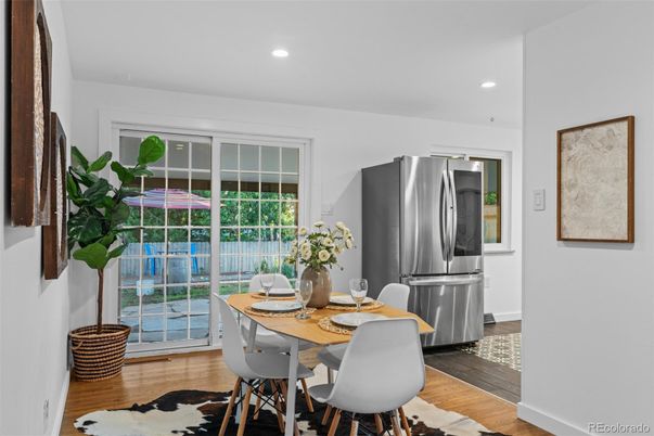 Dining room, Interior, Kitchen, Recessed Lighting, Stainless Steel Appliances, Wood Texture Flooring