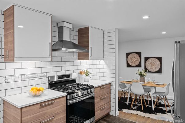 Dining room, Interior, Kitchen, Recessed Lighting, Stainless Steel Appliances, Wood Texture Flooring