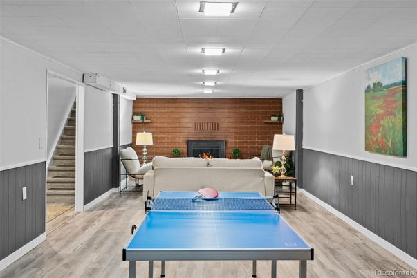 Fireplace, Game Room, Interior, Living room, Stone Walls, Wood Texture Flooring, Wooden Walls