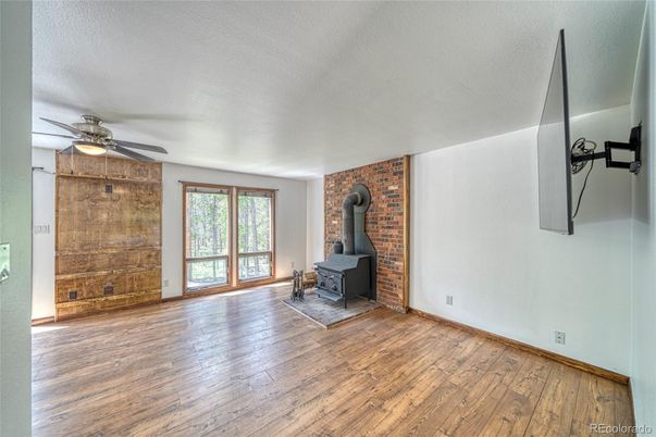Empty room, Fireplace, Interior, Stone Walls, Wood Texture Flooring