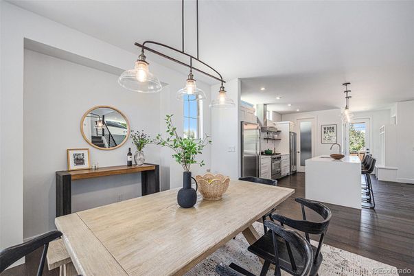 Dining room, Interior, Kitchen, Pendant Lights, Recessed Lighting, Stainless Steel Appliances, Wood Texture Flooring