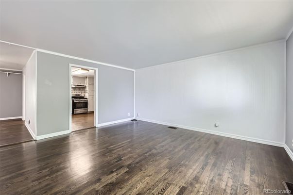Empty room, Interior, Kitchen, Stainless Steel Appliances, Wood Texture Flooring