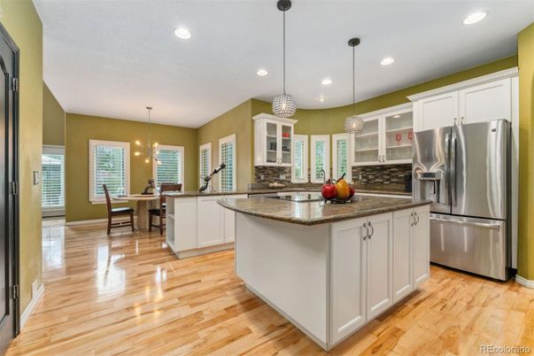 Dining room, Interior, Kitchen, Pendant Lights, Recessed Lighting, Stainless Steel Appliances, Wood Texture Flooring