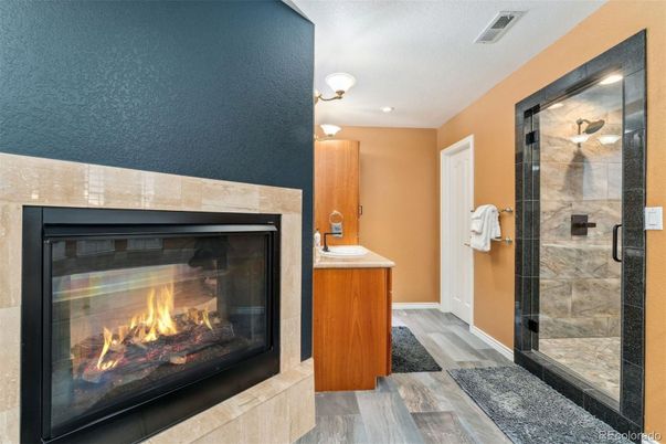 Bathroom, Fireplace, Glass Shower, Interior, Recessed Lighting