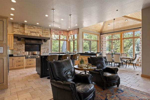 Dining room, Interior, Kitchen, Pendant Lights, Recessed Lighting, Stainless Steel Appliances, Stone Walls, Wooden Ceilings