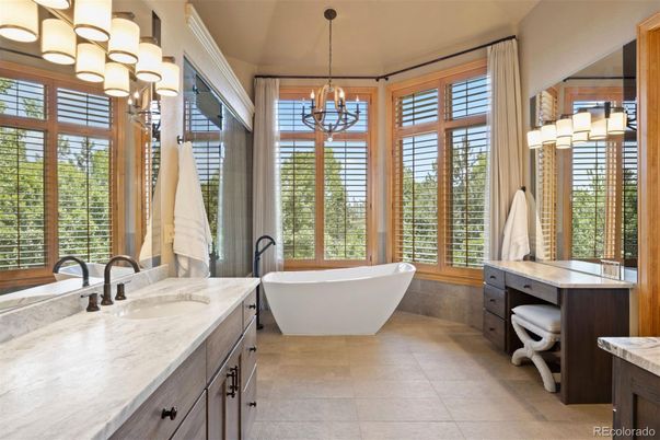 Bathroom, Chandelier, Dual Sink Vanities, Free Standing Baths, Interior, Pendant Lights