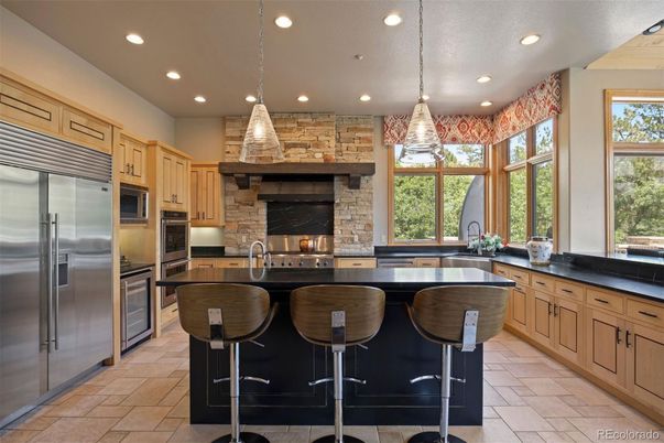 Interior, Kitchen, Pendant Lights, Recessed Lighting, Stainless Steel Appliances, Stone Walls