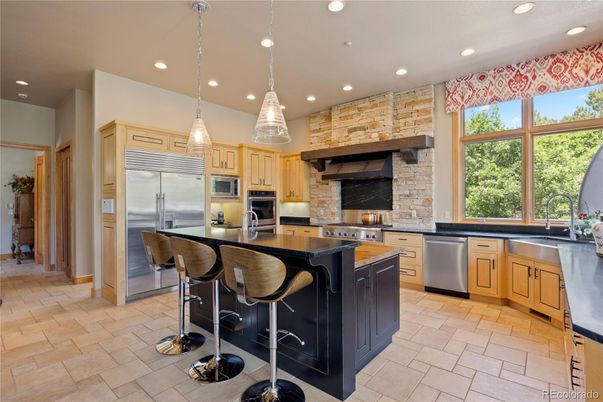 Interior, Kitchen, Pendant Lights, Recessed Lighting, Stainless Steel Appliances, Stone Walls