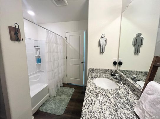 Bathroom, Dual Sink Vanities, Interior, Recessed Lighting, Wood Texture Flooring