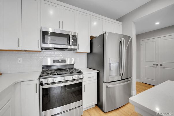 Interior, Kitchen, Recessed Lighting, Stainless Steel Appliances, Wood Texture Flooring