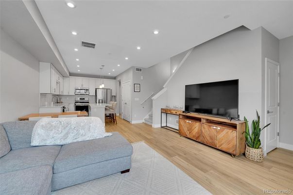 Dining room, Interior, Kitchen, Living room, Pendant Lights, Recessed Lighting, Stainless Steel Appliances, Wood Texture Flooring
