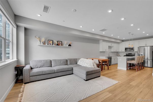 Dining room, Interior, Kitchen, Living room, Pendant Lights, Recessed Lighting, Stainless Steel Appliances, Wood Texture Flooring