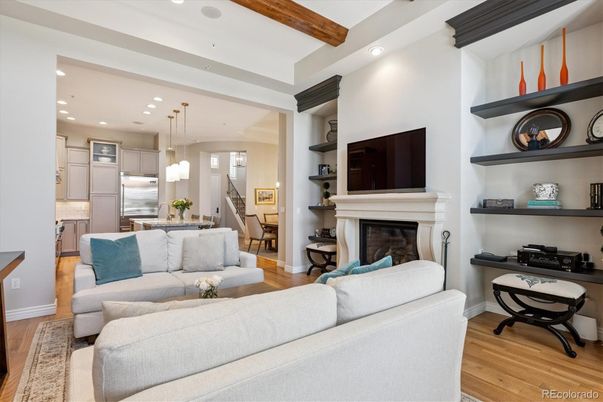 Dining room, Fireplace, Interior, Kitchen, Living room, Pendant Lights, Recessed Lighting, Stainless Steel Appliances, Wooden Beams, Wood Texture Flooring