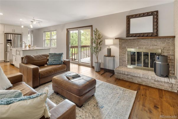 Fireplace, Interior, Kitchen, Living room, Recessed Lighting, Stainless Steel Appliances, Wood Texture Flooring