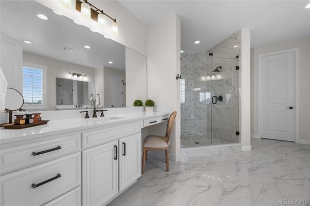 Bathroom, Dual Sink Vanities, Glass Shower, Interior, Marble, Marble Walls, Recessed Lighting
