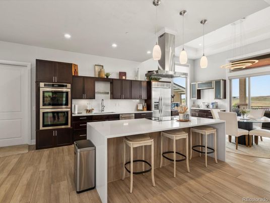 Dining room, Interior, Kitchen, Pendant Lights, Recessed Lighting, Stainless Steel Appliances, Wood Texture Flooring