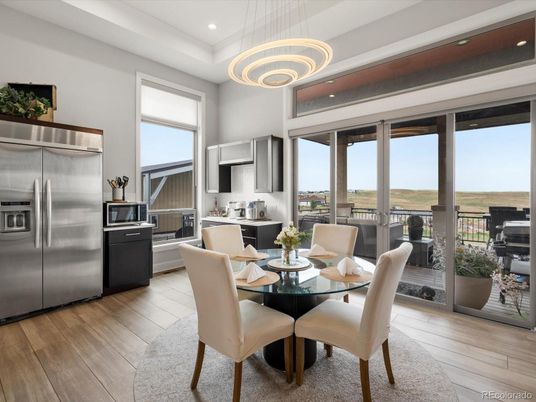 Dining room, Interior, Kitchen, Pendant Lights, Recessed Lighting, Stainless Steel Appliances, Wood Texture Flooring