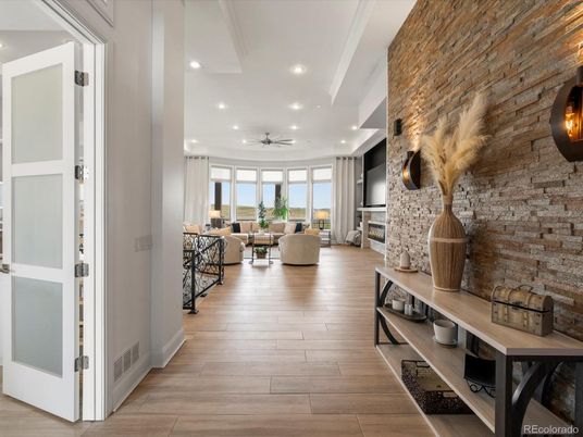 Fireplace, Interior, Living room, Recessed Lighting, Stone Walls, Wood Texture Flooring