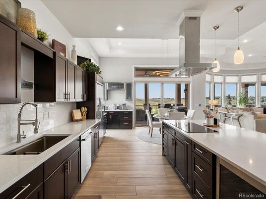 Dining room, Interior, Kitchen, Pendant Lights, Recessed Lighting, Stainless Steel Appliances, Wood Texture Flooring