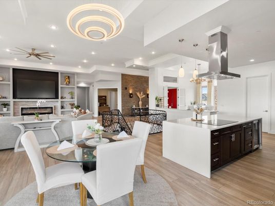 Dining room, Fireplace, Interior, Living room, Pendant Lights, Recessed Lighting, Stone Walls, Wood Texture Flooring