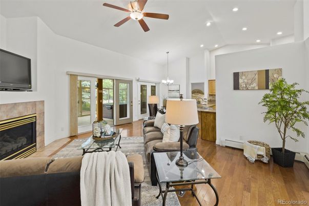 Chandelier, Dining room, Fireplace, Interior, Living room, Recessed Lighting, Wood Texture Flooring
