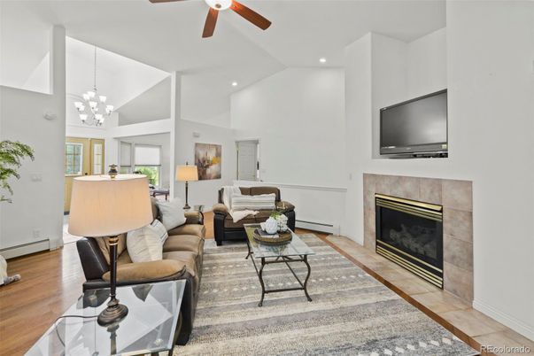 Chandelier, Fireplace, Interior, Living room, Pendant Lights, Recessed Lighting, Wood Texture Flooring