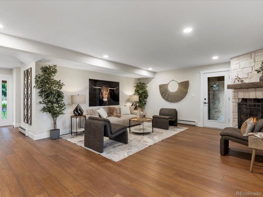 Fireplace, Interior, Living room, Recessed Lighting, Stone Walls, Wood Texture Flooring