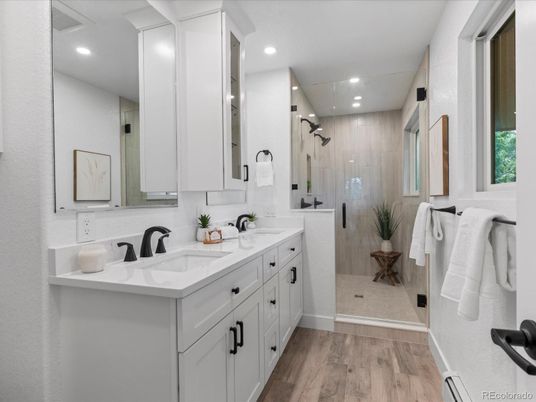Bathroom, Dual Sink Vanities, Glass Shower, Interior, Recessed Lighting, Wood Texture Flooring