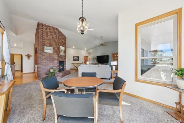Dining room, Fireplace, Interior, Living room, Pendant Lights, Recessed Lighting, Stone Walls, Wood Texture Flooring