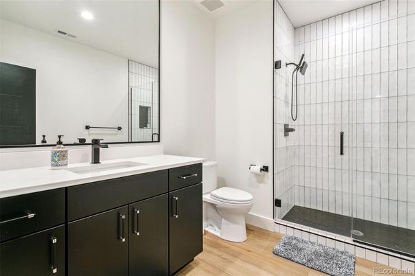 Bathroom, Glass Shower, Interior, Recessed Lighting, Wood Texture Flooring
