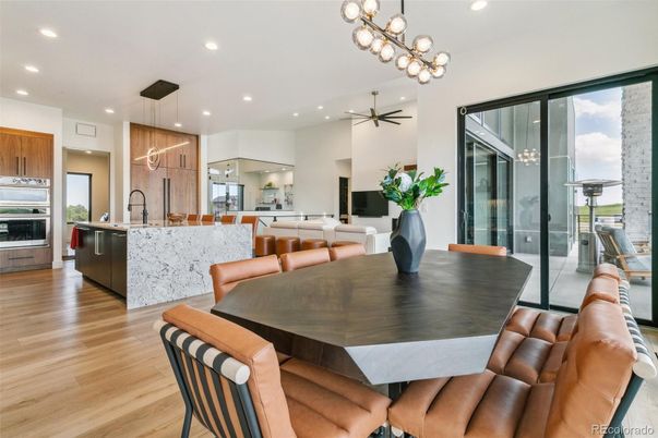Dining room, Interior, Kitchen, Living room, Pendant Lights, Recessed Lighting, Stainless Steel Appliances, Wood Texture Flooring