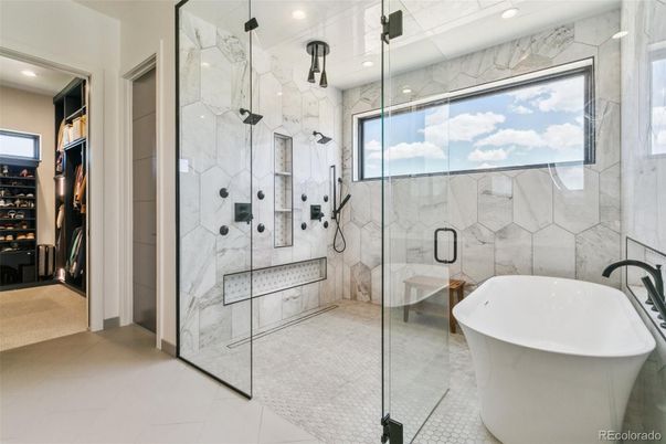 Bathroom, Free Standing Baths, Glass Shower, Interior, Marble Walls, Recessed Lighting