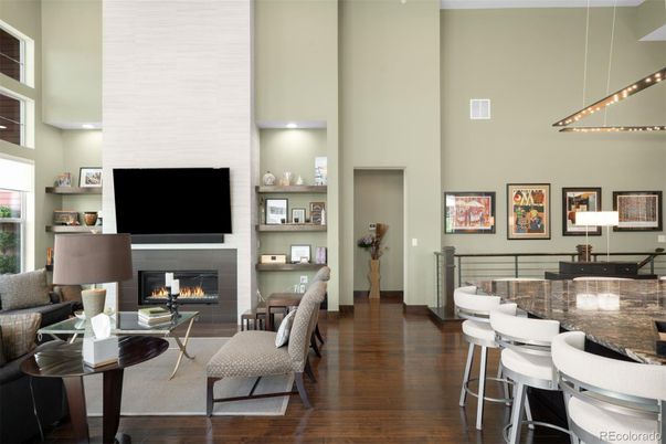 Dining room, Fireplace, Interior, Living room, Pendant Lights, Recessed Lighting, Wood Texture Flooring