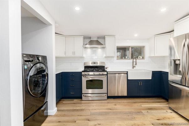 Interior, Kitchen, Recessed Lighting, Stainless Steel Appliances, Washer, Wood Texture Flooring