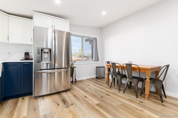 Dining room, Interior, Kitchen, Recessed Lighting, Stainless Steel Appliances, Wood Texture Flooring