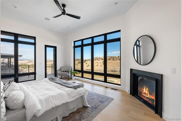 Bedroom, Fireplace, Interior, Recessed Lighting, Water, Wood Texture Flooring