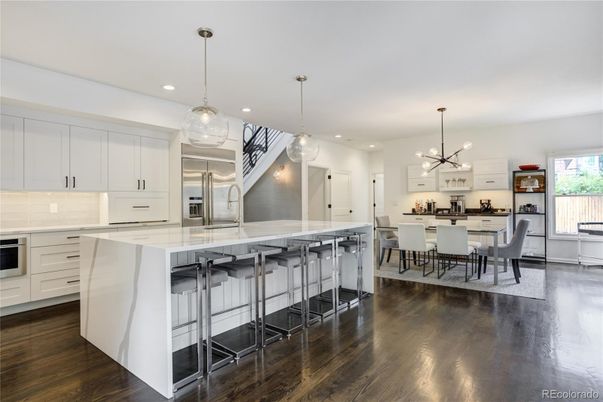 Dining room, Interior, Kitchen, Pendant Lights, Recessed Lighting, Stainless Steel Appliances, Wood Texture Flooring