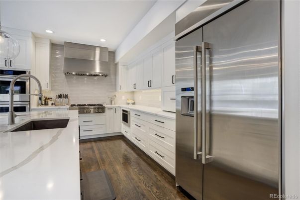 Interior, Kitchen, Recessed Lighting, Stainless Steel Appliances, Wood Texture Flooring