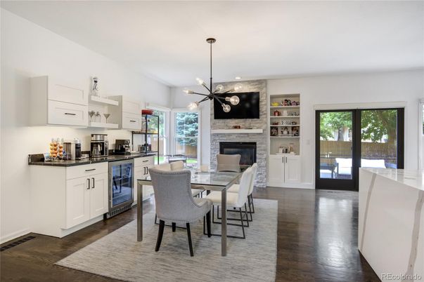Dining room, Fireplace, Interior, Kitchen, Pendant Lights, Recessed Lighting, Wood Texture Flooring