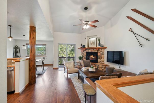 Dining room, Fireplace, Interior, Living room, Pendant Lights, Wood Texture Flooring